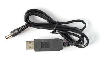 Step-up adapter - cable for USB router 5V to 12V DC 5.5x2.1. Cable with connectors on a white background