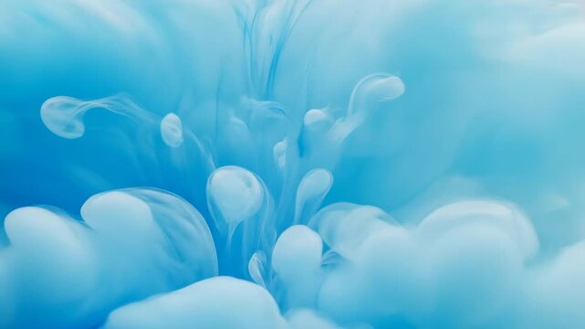 A continuous seamless loop of swirling blue and white ink gradually diffusing into a milky opaque field before clearing back to transparency digital art, transition, abstract background