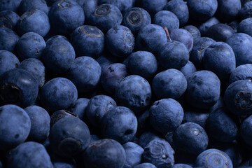 A Close-Up Image Of A Vibrant Pile Of Blueberries, Emphasizing Their Freshness And Appealing...