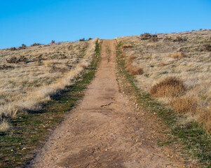 A hiking path running through the arid mountains