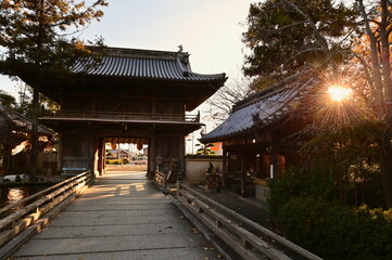 Fototapeta premium Dramatic Sunset Light Over Ryozenji Temple in Naruto, Tokushima Prefecture