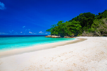 Beautiful crystal clear sea and white sand beach at Tachai island, Andaman, Thailand in summer. Copy space background
