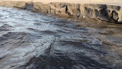 water flowing into the river