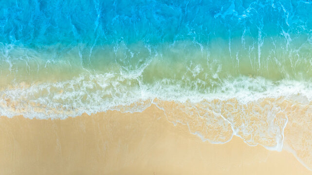 Nature of the ocean and blue sky Summer with sunshine, sandy beaches, clear blue waters sparkling against the blue sky. on an island with good ecology and environment Background for summer vacation