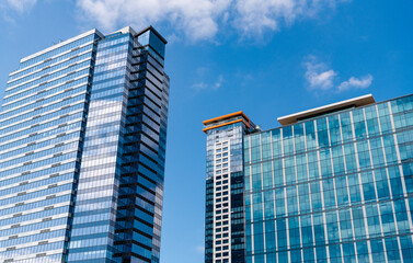 Architecture office building. Perspective skyscraper. Minimalist glass architecture. Business skyscraper building. Architectural building business area. Glass skyscraper. City metropolis architecture