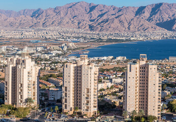 Aerial panoramic view on northern beach of the Red Sea and area of the biggest resort hotels in Eilat &ndash; famous tourist and recreation city in Israel