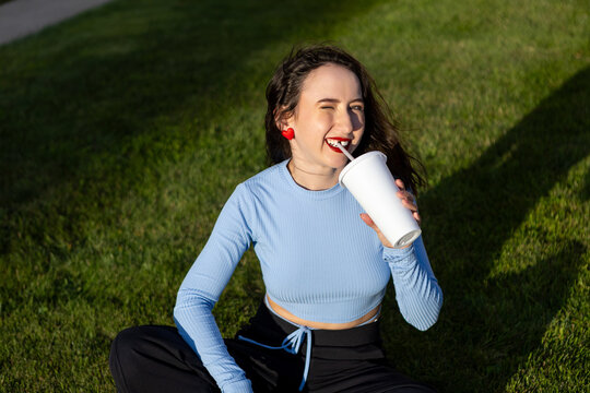 Mature Caucasian brunette woman missing a front tooth. Adult toothless woman