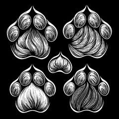 Four paw prints in white on black