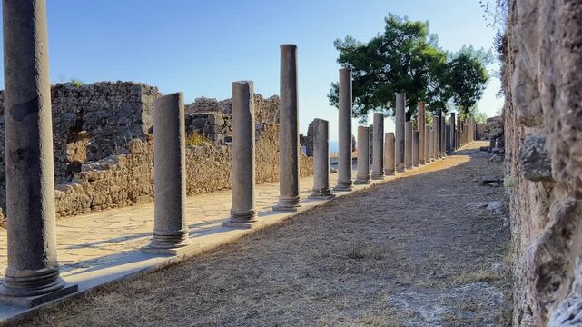 Ruins of the ancient Roman port city of Siedra in Alanya, Antalya, Turkey. The street and ruins of the ancient abandoned ancient city of Siedra on the Mediterranean coast. 4К