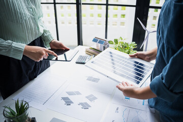 Solar panels green energy Business people working in green eco friendly office business meeting creative ideas for business eco friendly professional teaching corporate people sustainable electricity © Charlie's