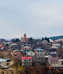 View of Rabati St. Marine Church from the castle walls in Akhaltsikhe, Georgia, showing its stone structure, cross-shaped architecture, and surrounding medieval fortress