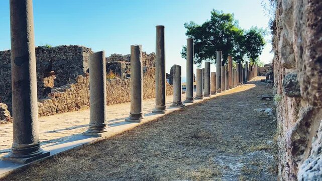 Ruins of the ancient Roman port city of Siedra in Alanya, Antalya, Turkey. The street and ruins of the ancient abandoned ancient city of Siedra on the Mediterranean coast. 4К
