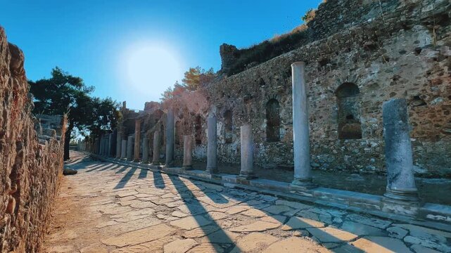 Ruins of the ancient Roman port city of Siedra in Alanya, Antalya, Turkey. The street and ruins of the ancient abandoned ancient city of Siedra on the Mediterranean coast. 4К