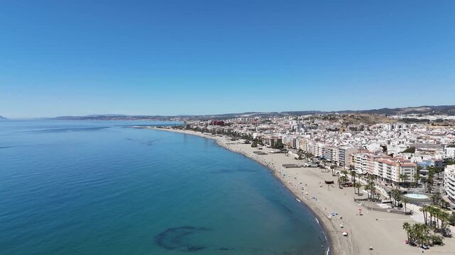 Aerial view of Playa de la Rada in Estepona, filmed with DJI Mini 4 Pro at Andalucia, Spain in 2024.