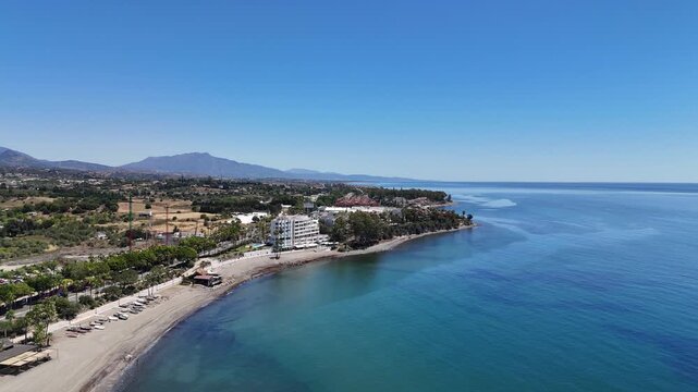 Aerial view of Playa de la Rada in Estepona, filmed with DJI Mini 4 Pro at Andalucia, Spain in 2024.
