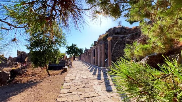 Ruins of the ancient Roman port city of Siedra in Alanya, Antalya, Turkey. The street and ruins of the ancient abandoned ancient city of Siedra on the Mediterranean coast. 4К