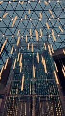 A modern architectural interior featuring a geometric ceiling with hanging light fixtures, creating a visually striking pattern