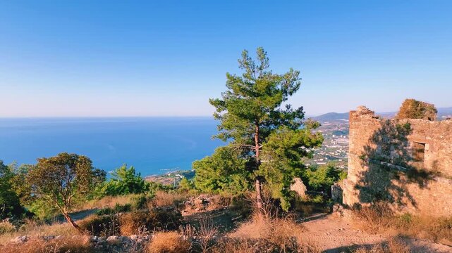 Ruins of the ancient Roman port city of Siedra in Alanya, Antalya, Turkey. The street and ruins of the ancient abandoned ancient city of Siedra on the Mediterranean coast. 4К