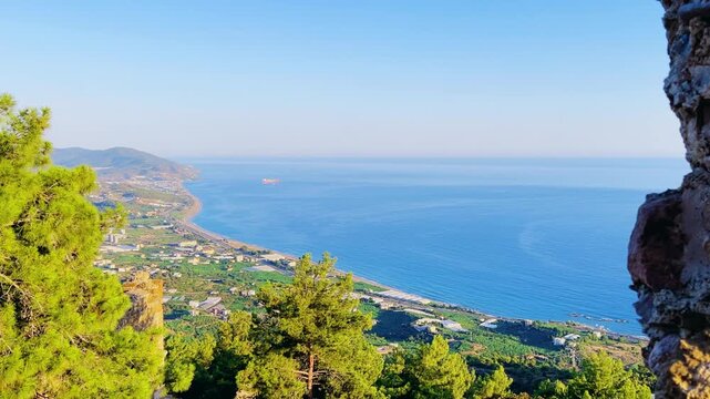 Ruins of the ancient Roman port city of Siedra in Alanya, Antalya, Turkey. The street and ruins of the ancient abandoned ancient city of Siedra on the Mediterranean coast. 4К