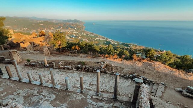 Ruins of the ancient Roman port city of Siedra in Alanya, Antalya, Turkey. The street and ruins of the ancient abandoned ancient city of Siedra on the Mediterranean coast. 4К