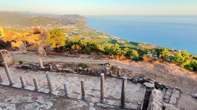 Ruins of the ancient Roman port city of Siedra in Alanya, Antalya, Turkey. The street and ruins of the ancient abandoned ancient city of Siedra on the Mediterranean coast. 4К