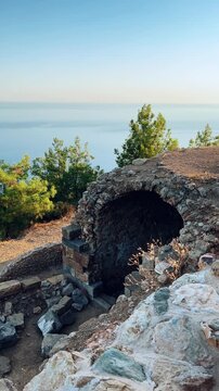Ruins of the ancient Roman port city of Siedra in Alanya, Antalya, Turkey. The street and ruins of the ancient abandoned ancient city of Siedra on the Mediterranean coast. 4К