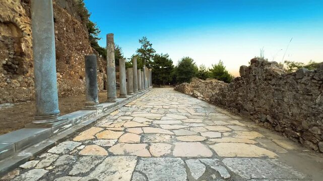 Ruins of the ancient Roman port city of Siedra in Alanya, Antalya, Turkey. The street and ruins of the ancient abandoned ancient city of Siedra on the Mediterranean coast. 4К