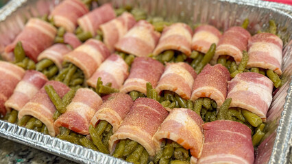Raw Fresh Green Bean Bundles Wrapped in Bacon Ready to be Cooked