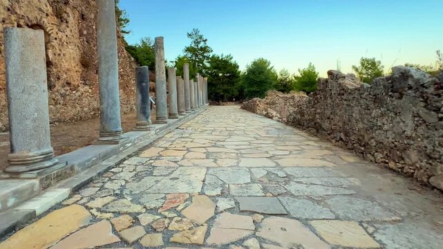 Ruins of the ancient Roman port city of Siedra in Alanya, Antalya, Turkey. The street and ruins of the ancient abandoned ancient city of Siedra on the Mediterranean coast. 4К