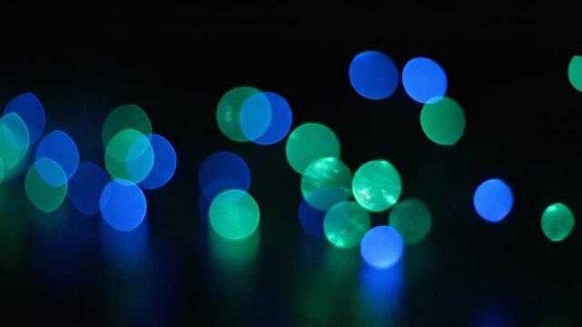 Abstract colorful glowing lights background with soft bokeh effects