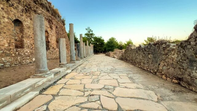 Ruins of the ancient Roman port city of Siedra in Alanya, Antalya, Turkey. The street and ruins of the ancient abandoned ancient city of Siedra on the Mediterranean coast. 4К