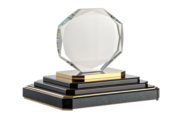 Gold trophy cup and gold medal displayed on a stack of books isolated on a white background representing education, knowledge, and achievement