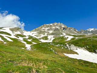 Italian mountain landscape in the alps on a July Morning  