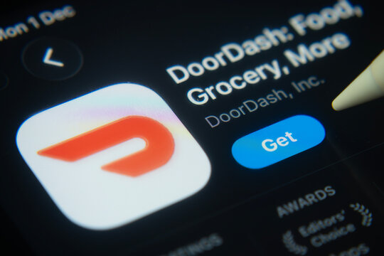 Dhaka, Bangladesh- 01 Dec 2025: A close-up of the DoorDash app icon in the App Store on an iPad screen.