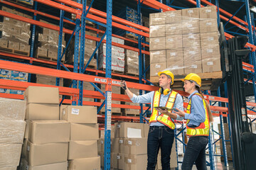 Caucasian man, woman warehouse supervisor discuss and use tablet check package with forklift driver worker load box on shelf, product distribution inventory management,Logistics shipping business plan