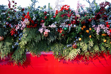 Decorations made from fir branches and toys .