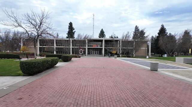 This first person walk across the California State University, Stanislaus campus captures daily campus scenery and modern facilities.