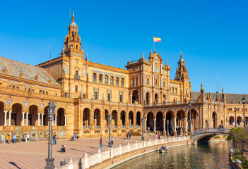 Fototapeta premium Architecture and canals of Spain square in Seville, Spain