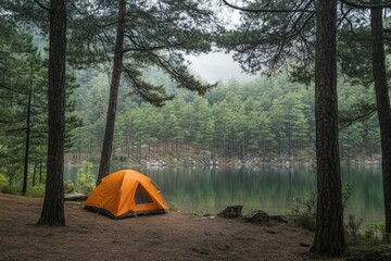 A serene lakeside campsite nestled within a verdant forest, where the soft glow of the setting sun casts a warm light on the tranquil waters.