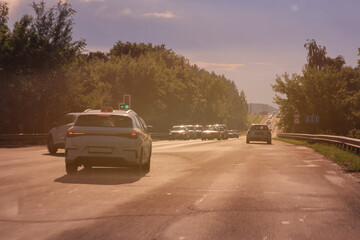 orange evening views of the road highway on a sunny day in summer. 