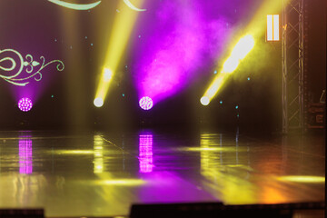 Theater and concert stage, colored smoke in stage light	