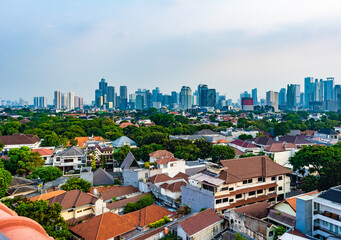 Central Jakarta cityscape at an afternoon, close to sunset.