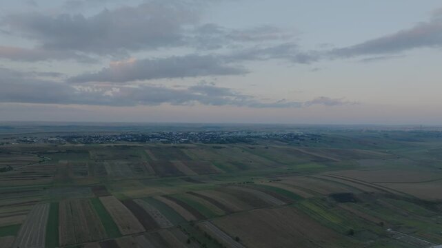 Agriculture field near Botosani, aerial overview of Romanian city - drone shot 4k