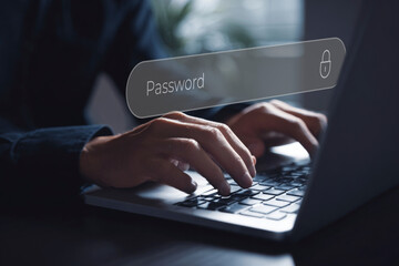 Person typing a password on a laptop keyboard, illustrating concepts of digital security, online login, data protection, and secure access to sensitive information in a modern technological context.