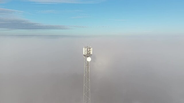 5g and 6g mobile network tower above mist