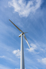 Wind Turbine Against Blue Sky for Clean Renewable Energy