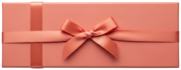 Textured coral colored box adorned with a soft wide satin bow photographed from overhead against a blank backdrop