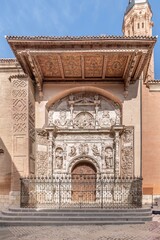 Naklejka premium Plateresque Renaissance Portal and Carved Wooden Eaves of the Collegiate Church of Santa Maria la Mayor, a UNESCO Site in Calatayud