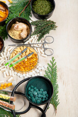 Alternative medicine herbal organic capsule. Herbs leaf natural supplements for healthy good life.