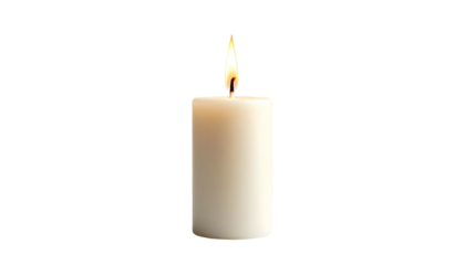 A lit, white cylindrical candle glows against a black background